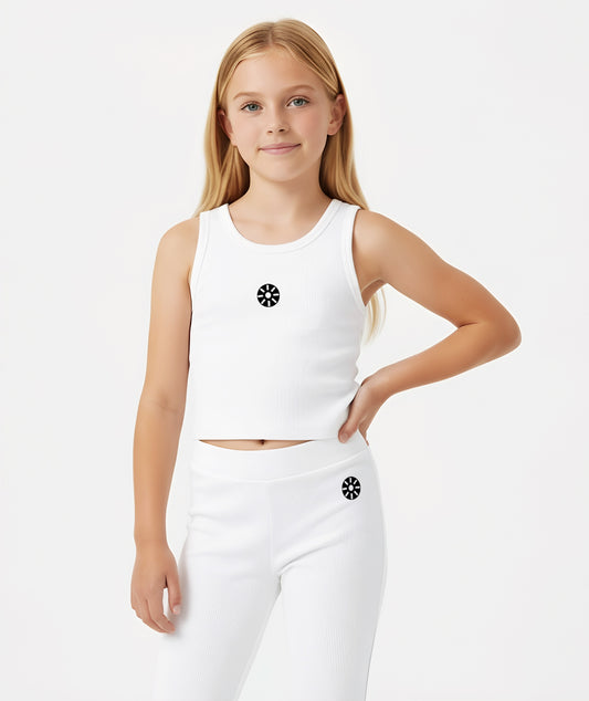 A girl wearing a white cotton tank top paired with matching leggings, showcasing the Goldencubs logo and a sporty, minimalist design perfect for everyday wear.