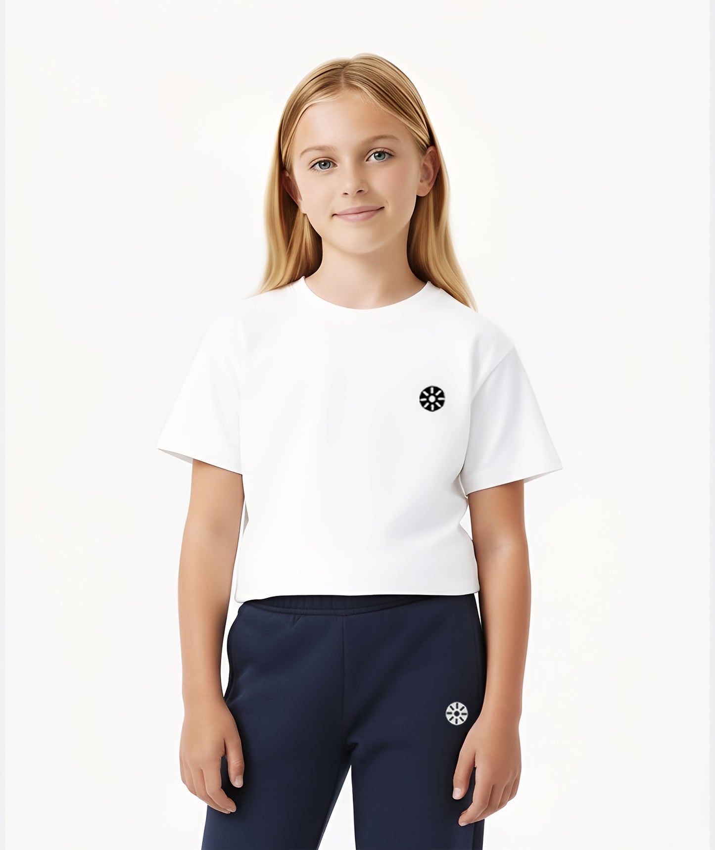 Close-up of Goldencubs girls white cotton cropped T-shirt with logo detail, highlighting the smooth fabric and trendy short-cut design ideal for everyday wear.