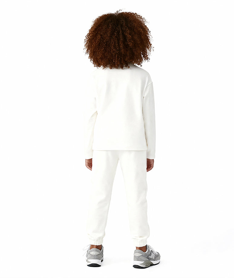 Back view of Goldencubs girls white cotton long sleeve T-shirt with matching pants, showcasing the smooth premium cotton fabric and relaxed, comfortable fit for active girls aged 3–14 years.